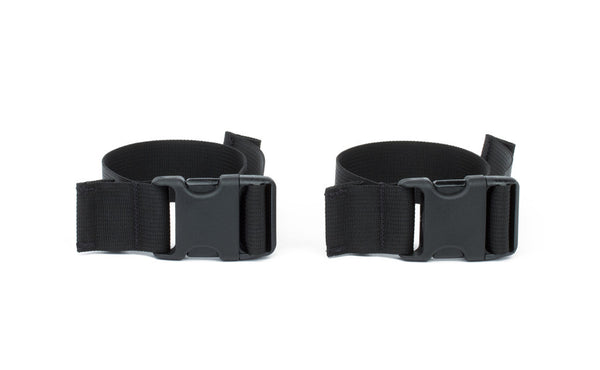 A pair of stroller/wheelchair adapter straps.